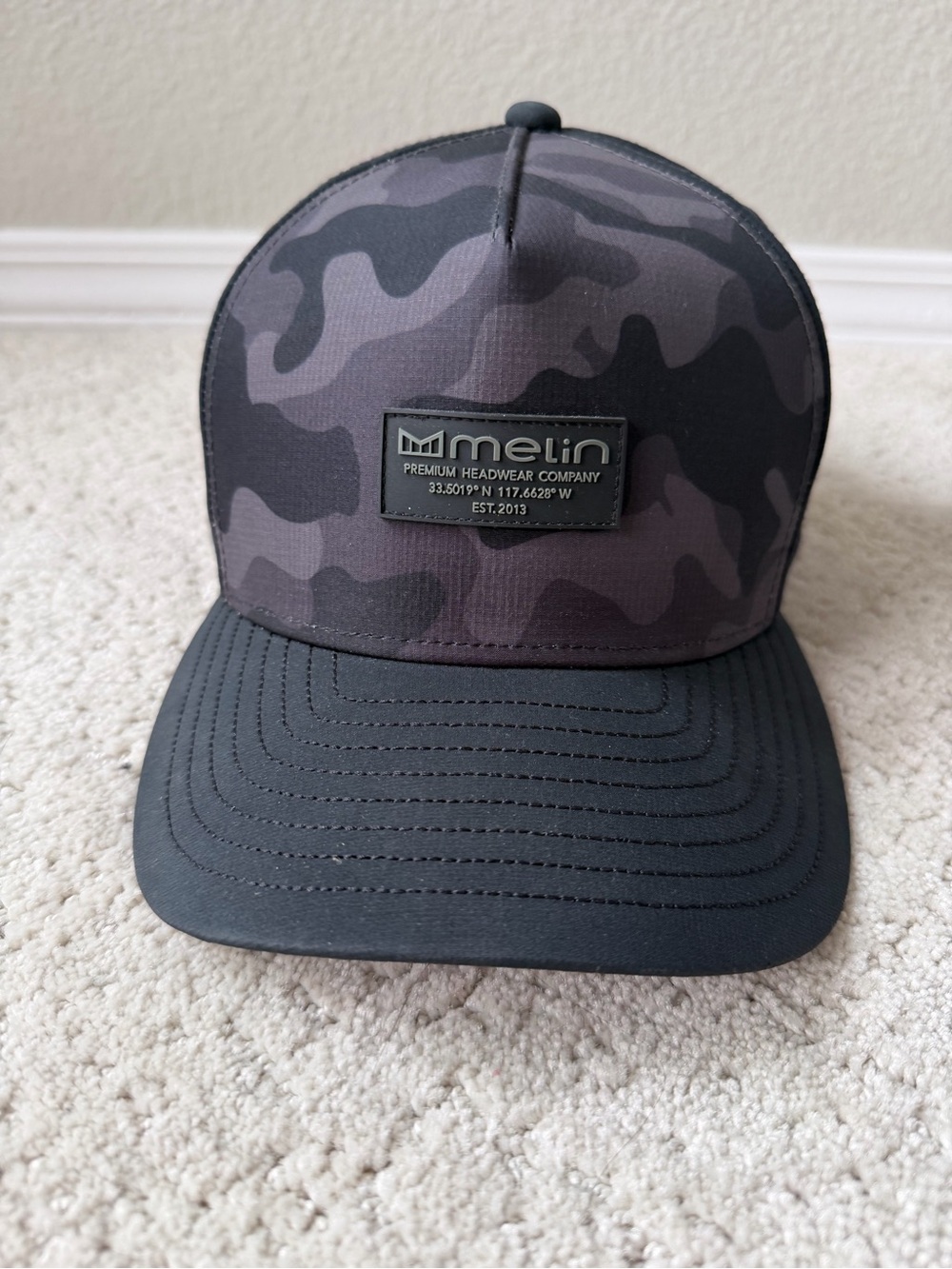 Melin Men’s Black Camouflage Trucker Hat